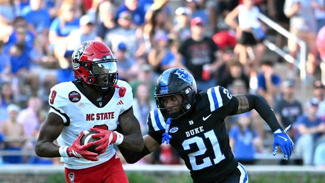  Sep 20, 2025; Durham, North Carolina, USA; North Carolina State Wolfpack wide receiver Terrell Anderson (9) runs the ball during the second quarter against Duke Blue Devils cornerback Landan Callahan (21) at Wallace Wade Stadium. Mandatory Credit: Zachary Taft-Imagn Images | Zachary Taft-Imagn Images 