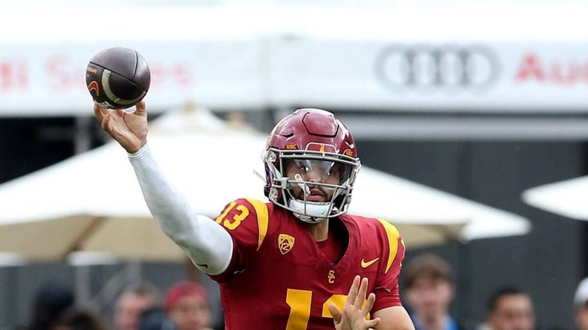  Nov 18, 2023; Los Angeles, California, USA; USC Trojans quarterback Caleb Williams (13) throws during the first quarter against the UCLA Bruins at United Airlines Field at Los Angeles Memorial Coliseum. | Jason Parkhurst-Imagn Images 