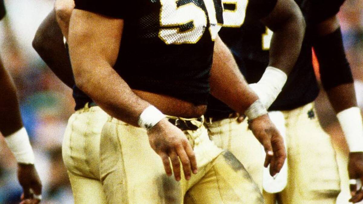  Jan 2, 1989; Tempe, AZ, USA; FILE PHOTO; Notre Dame Irish defensive tackle Chris Zorich (50) on the field against the West Virginia Mountaineers during the 1989 National Championship Fiesta Bowl at Sun Devil Stadium. Notre Dame defeated West Virginia 34-21. | Malcolm Emmons-Imagn Images 