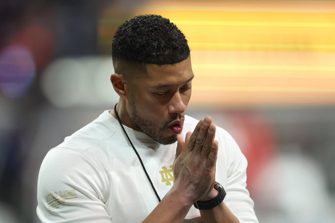  ATLANTA, GEORGIA - JANUARY 20: Head coach Marcus Freeman of the Notre Dame Fighting Irish looks on prior to the 2025 CFP National Championship against the Ohio State Buckeyes at the Mercedes-Benz Stadium on January 20, 2025 in Atlanta, Georgia. (Photo by Jamie Squire/Getty Images) 