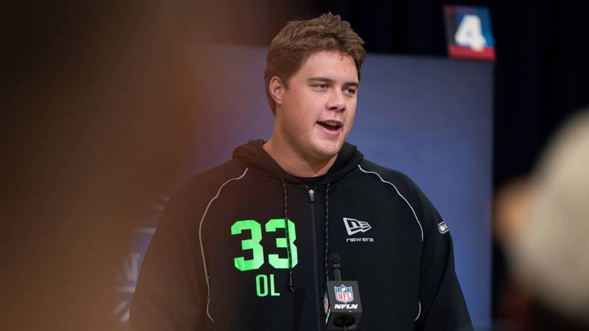 Feb 28, 2026; Indianapolis, IN, USA; Utah offensive lineman Caleb Lomu (OL33) speaks to members of the media during the NFL Combine at the Indiana Convention Center. Mandatory Credit: Jacob Musselman-Imagn Images | IMAGN IMAGES via Reuters Connect 