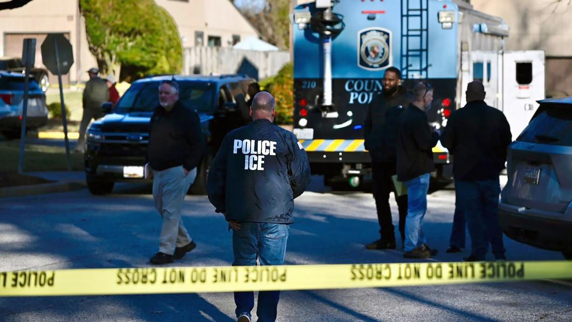 Immigration and Customs Enforcement agents and other law enforcement officials investigate a shooting Wednesday, Dec. 24, 2025, in Glen Burnie, Maryland. Anne Arundel Police say the driver of a white van tried to run over ICE officers. (Surya Vaidy/The Baltimore Sun/TNS)