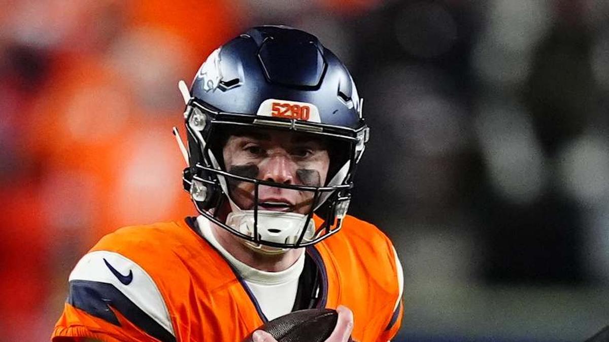  Jan 17, 2026; Denver, CO, USA; Denver Broncos quarterback Bo Nix (10) runs during the fourth quarter of an AFC Divisional Round playoff game against the Buffalo Bills at Empower Field at Mile High. Mandatory Credit: Ron Chenoy-Imagn Images | Ron Chenoy-Imagn Images 