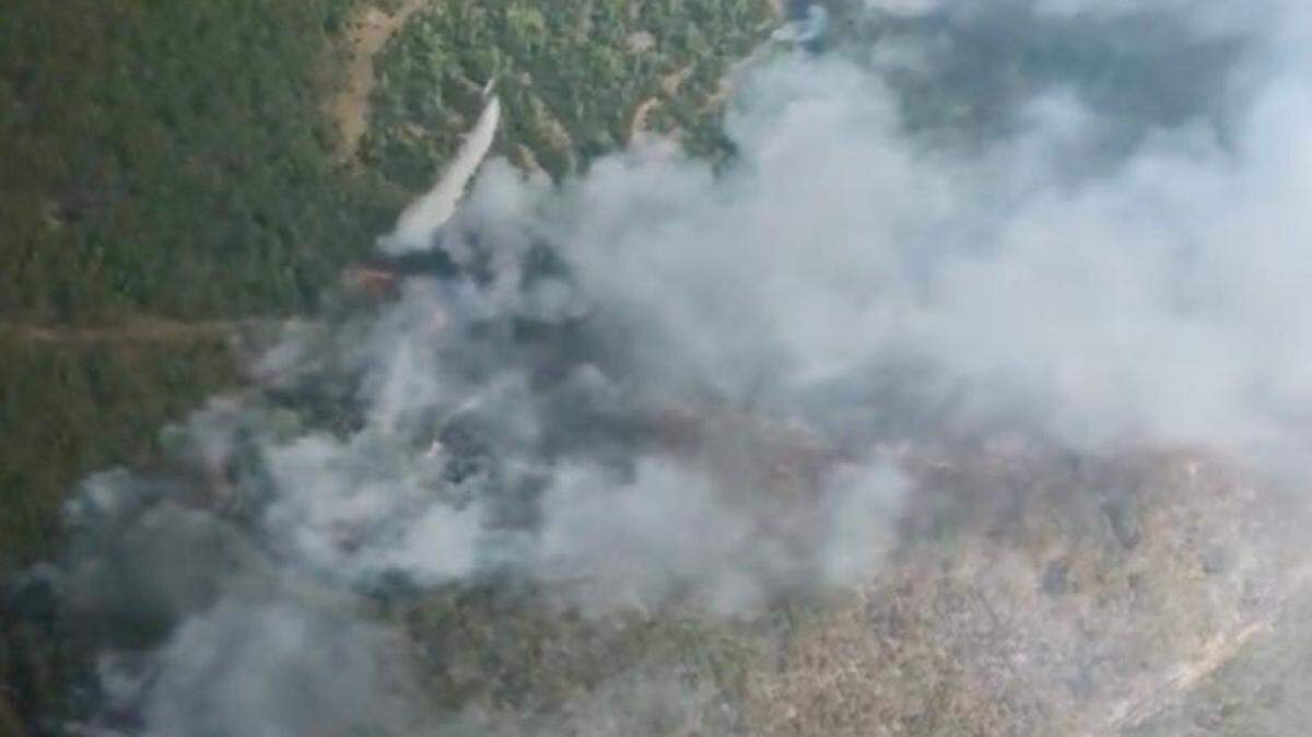 A major wildfire burns through Clinch County in Georgia which started Monday, April 20, 2026.