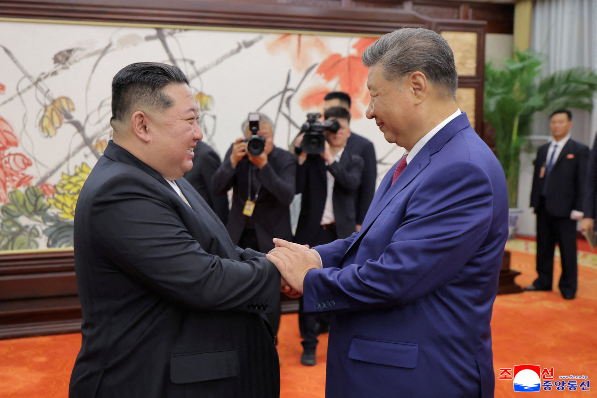 North Korean leader Kim Jong Un and Chinese President Xi Jinping shake hands on the day of their bilateral summit in Beijing, China, September 4, 2025, in this picture released by North Korea's official Korean Central News Agency.   KCNA via REUTERS