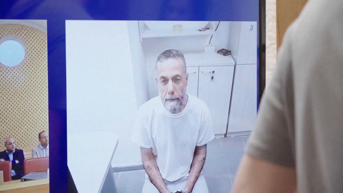 Palestinian doctor Hussam Abu Safiya, who was captured by the Israeli military in Gaza in late 2024 and still held in detention, appears via video link at the Israeli Supreme Court hearing in Jerusalem, June 10, 2026. REUTERS TV via REUTERS