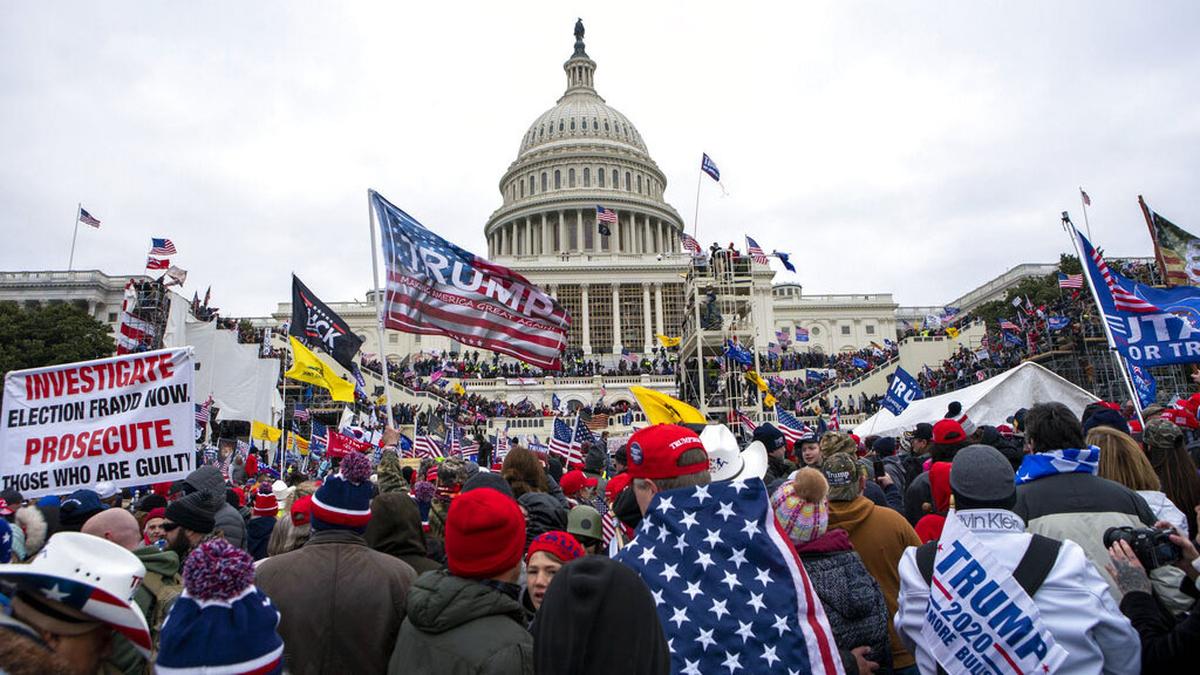 Rioters loyal to President Donald Trump rally at the U.S. Capitol in Washington on Jan. 6, 2021. A 36-year-old North Carolina man was sentenced to five months in prison on Tuesday, Dec. 6, 2022, for his “egregious behavior” helping breach the capitol, prosecutors said.