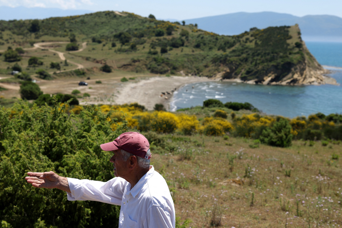Kostaq Konomi, who claims to be one of the owners of the land where a luxury resort is planned by a company linked to Donald Trump's son-in-law, Jared Kushner looks on at the bay of the Vjosa-Narta Protected Area, in Zvernec near Vlora, Albania, June 10, 2026. REUTERS/Florion Goga