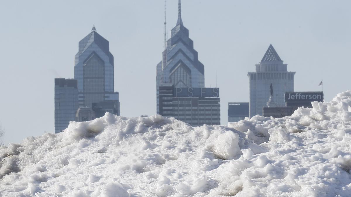 Snow and ice debris is piled along the Camden waterfront in Camden, New Jersey, framing the Philadelphia skyline across the Delaware River, on Feb. 5, 2026. (Jose F. Moreno/The Philadelphia Inquirer/TNS)