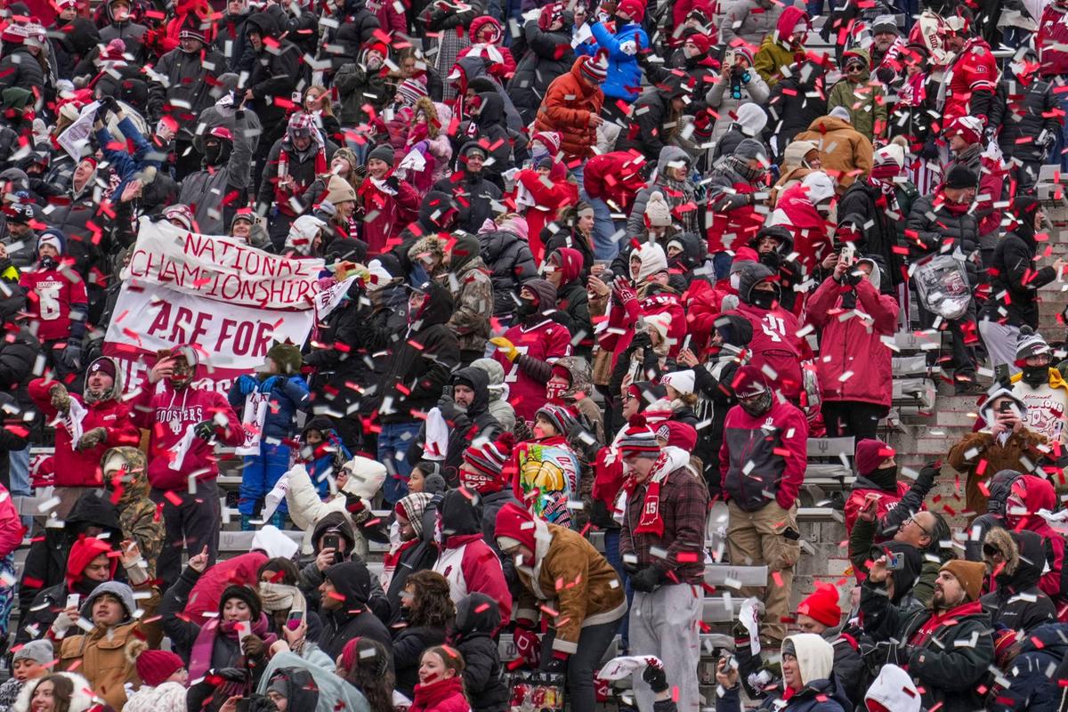  Fans celebrates as confetti falls Saturday, Jan. 24, 2026, during a championship celebration for the Indiana Hoosiers at Memorial Stadium. Grace Smith-USA TODAY Network via Imagn Images