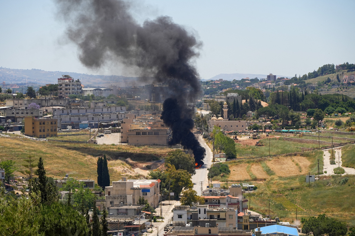 Black smoke billows at a strike scene following an Israeli strike on a car as seen from Nabatieh, Lebanon, June 5, 2026. REUTERS/Stringer