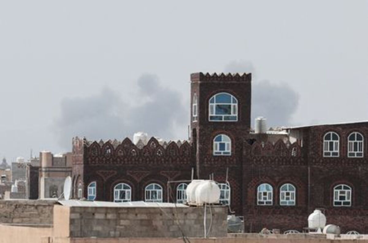Smoke rises after an airstrike hit the Sanaa International Airport, as seen from Sanaa, Yemen, July 13, 2026. REUTERS/Khaled Abdullah