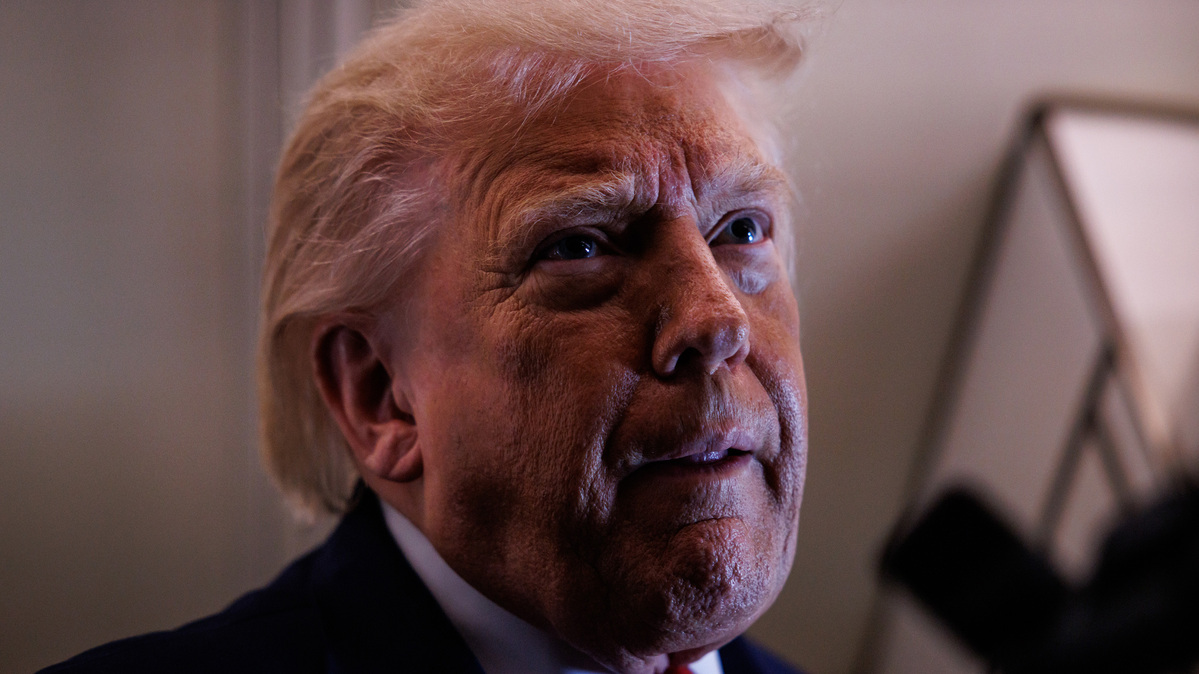 U.S. President Donald Trump speaks with reporters while aboard Air Force One on June 5, 2026, en route to Chippewa Falls, Wisconsin. (Samuel Corum/Getty Images/TNS)
