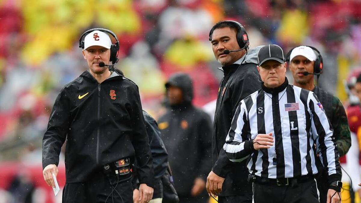  Nov 15, 2025; Los Angeles, California, USA; Southern California Trojans head coach Lincoln Riley watches game action against the Iowa Hawkeyes during the first half at the Los Angeles Memorial Coliseum. Mandatory Credit: Gary A. Vasquez-Imagn Images | Gary A. Vasquez-Imagn Images 