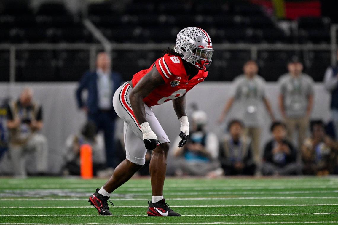  Dec 31, 2025; Arlington, TX, USA; Ohio State Buckeyes linebacker Arvell Reese (8) gets into position during the 2025 Cotton Bowl and quarterfinal game of the College Football Playoff at AT&T Stadium. Mandatory Credit: Jerome Miron-Imagn Images 