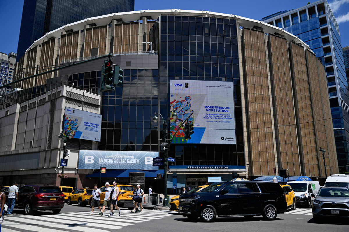 People walk past Madison Square Garden in Manhattan, in New York City, U.S., June 24, 2026.   REUTERS/Vincent Alban