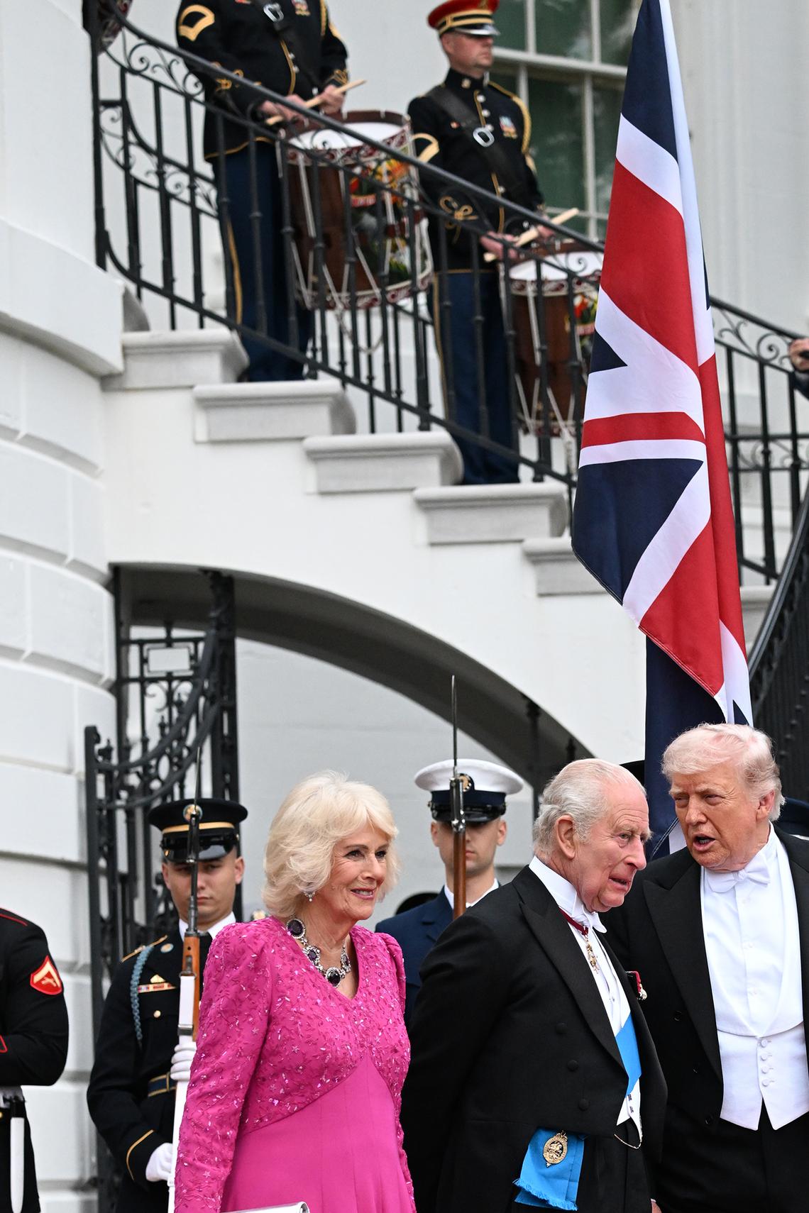 President Donald Trump and first lady Melania Trump, right, greet King Charles III and Queen Camilla of the United Kingdom as they arrive for a state dinner at the White House in Washington, on Tuesday, April 28, 2026. (Kenny Holston/The New York Times)