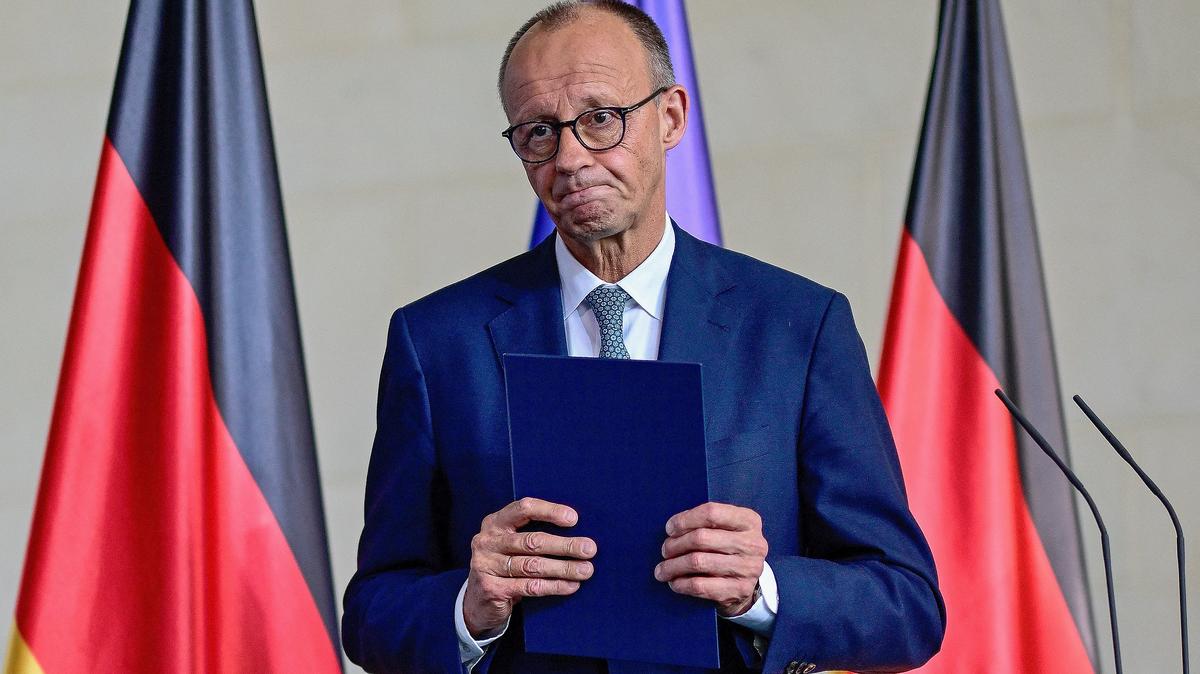 German Chancellor Friedrich Merz leaves after making a statement to journalists following a meeting of the security Cabinet of the German government at the Chancellery in Berlin on July 28, 2025.