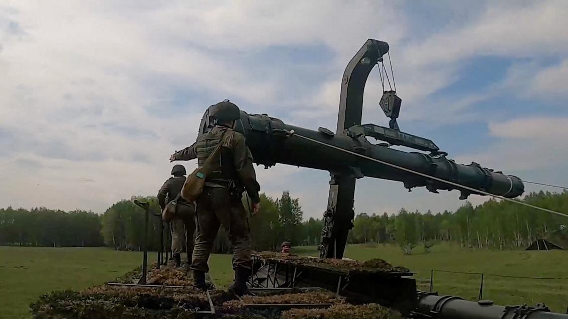 Russia shows troops moving nuclear warheads in major exercise 