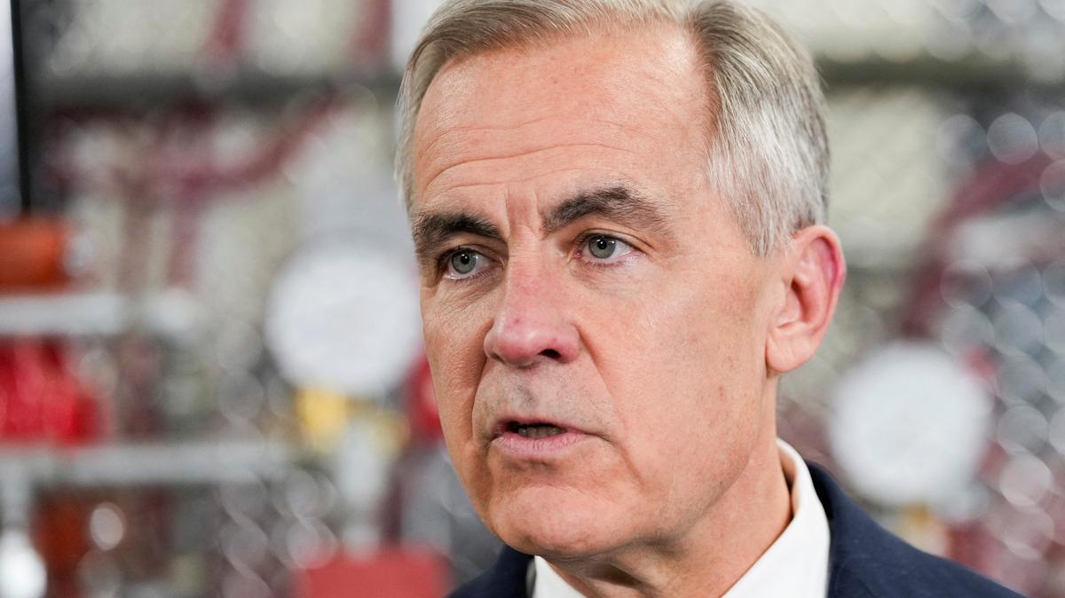 Canada's Prime Minister Mark Carney speaks as he meets unionized skilled trades workers at the United Association of Journeymen and Apprentices of the Plumbing and Pipefitting Industry of the United States and Canada (UA) office in Calgary, Alberta, Canada, May 15, 2026.  REUTERS/Todd Korol