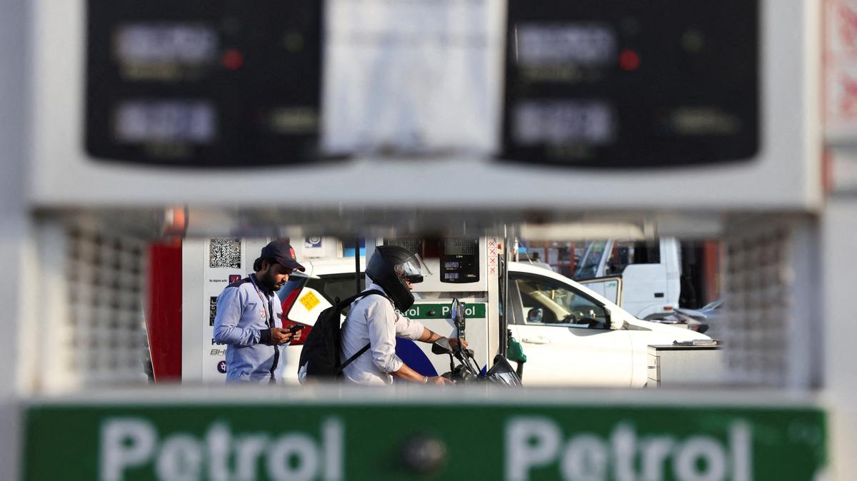 FILE PHOTO: A customer leaves after refuelling his bike at a fuel station in New Delhi, India, March 6, 2026. REUTERS/Bhawika Chhabra/File Photo