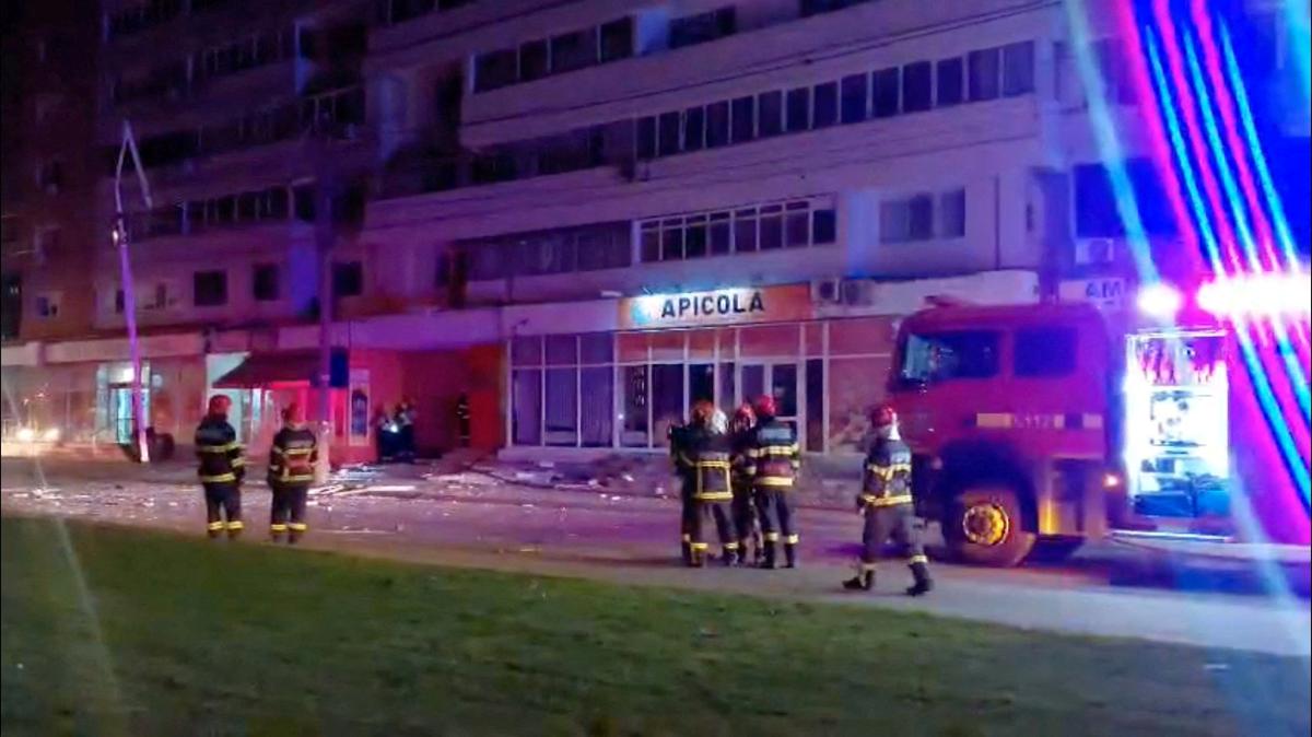 Firefighters work near a building, which, according to a Facebook post by Romanian radio station Pro Lider FM, was hit by a drone, close to the border with Ukraine, in Galati, Romania, in this screengrab obtained from a handout video released on May 29, 2026. ISU Galati/Handout via REUTERS