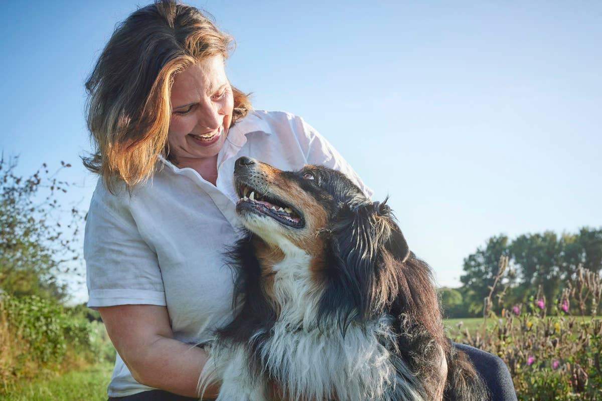  A dog who loves its woman owner.