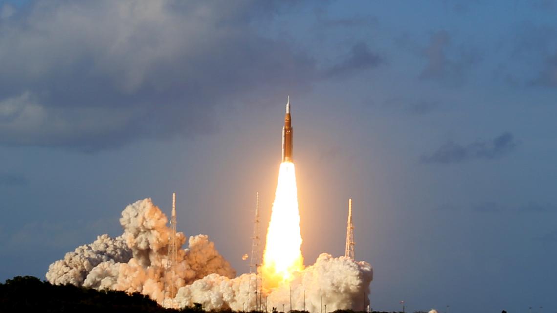 The Space Launch System rocket topped with the Orion capsule carrying the four astronauts of the Artemis II mission launches from Kennedy Space Center's Launch Pad 39-B on Wednesday, April 1, 2026. (Richard Tribou/Orlando Sentinel/TNS)