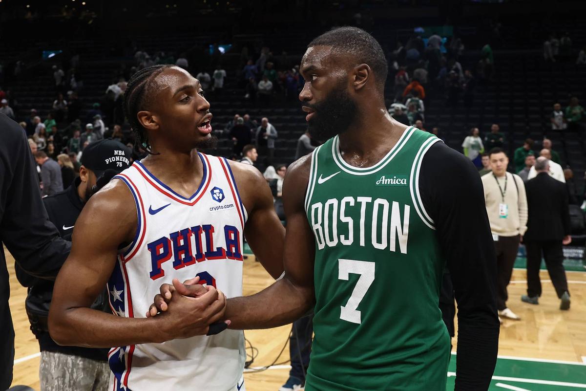  Philadelphia 76ers guard Tyrese Maxey (0) talks with Boston Celtics guard Jaylen Brown (7)after Philadephia's win in game seven of the first round of the 2026 NBA Playoffs. 