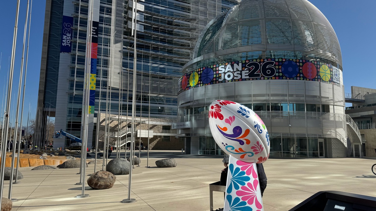An artistic rendition of the Lombardi trophy by San Jose artist Emilio Cortez stands in front of San Jose City Hall before a Super Bowl LX flag-raising on Tuesday, Feb. 3, 2026. (Sal Pizarro/Bay Area News Group)