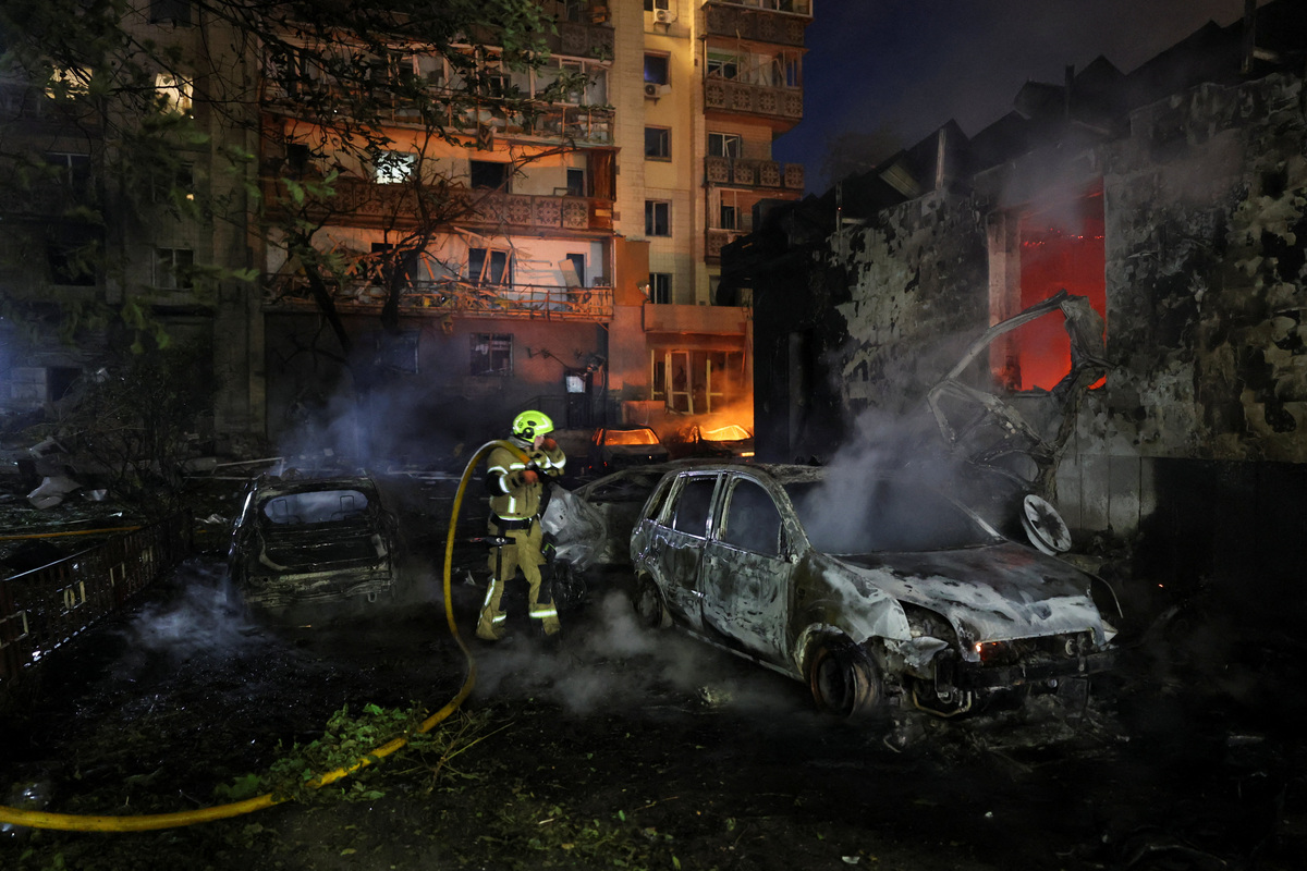 A firefighter works at the site of an apartment building damaged during Russian missile strikes, amid Russia’s attack on Ukraine, in Kyiv, Ukraine July 19, 2026. REUTERS/Gleb Garanich
