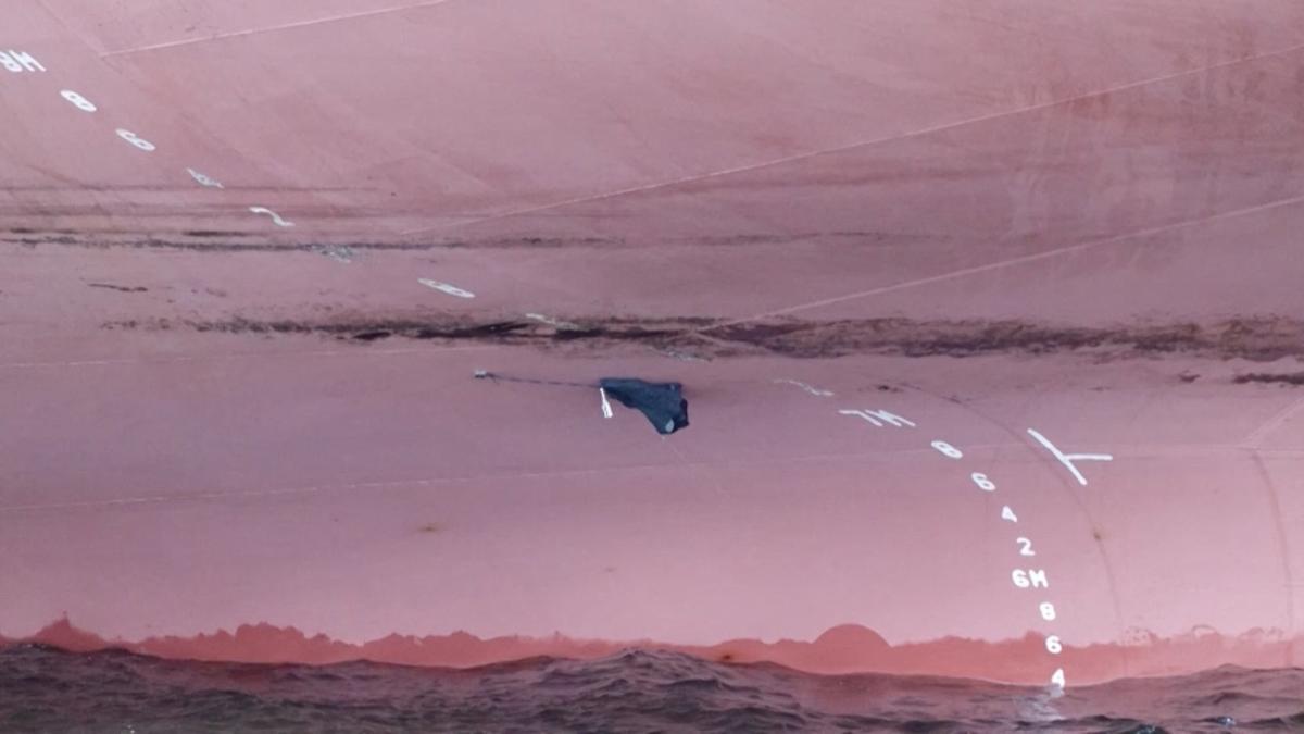 A still image from a video released by Russian state media shows what is said to be a mine found on the hull of the Liberia-flagged tanker Arrhenius in the Baltic Sea port of Ust-Luga in the Leningraad region, Russia, the video released on May 25, 2026. Russian State Media/Handout via REUTERS