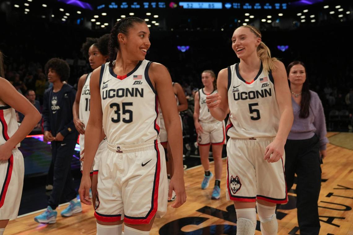  UConn Huskies teammates Azzi Fudd and Paige Bueckers interact during an NCAA game in 2024 Lucas Boland-Imagn Images