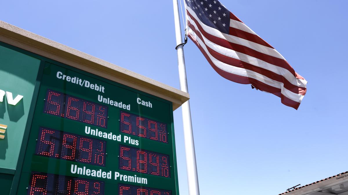 Trump Administration To Pause Gas Tax As Prices Soar Amid Iran War. An American flag flies above gas prices displayed at a gas station on May 11, 2026 in Arcadia, California. 