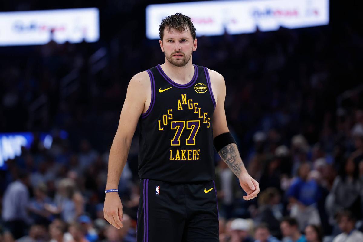  Apr 2, 2026; Oklahoma City, Oklahoma, USA; Los Angeles Lakers guard Luka Doncic (77) stands on the court during the second half against the Oklahoma City Thunder at Paycom Center. Mandatory Credit: Alonzo Adams-Imagn Images 