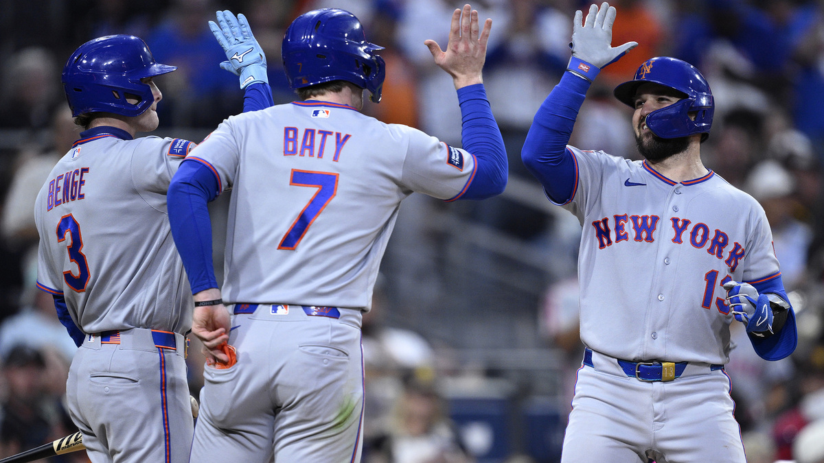 The New York Mets' Luis Torrens (13) is congratulated by Carson Benge (3) and Brett Baty (7) after hitting a two-run home run against the San Diego Padres during the fifth inning at Petco Park on Friday, June 5, 2026, San Diego. (Orlando Ramirez/Getty Images/TNS)