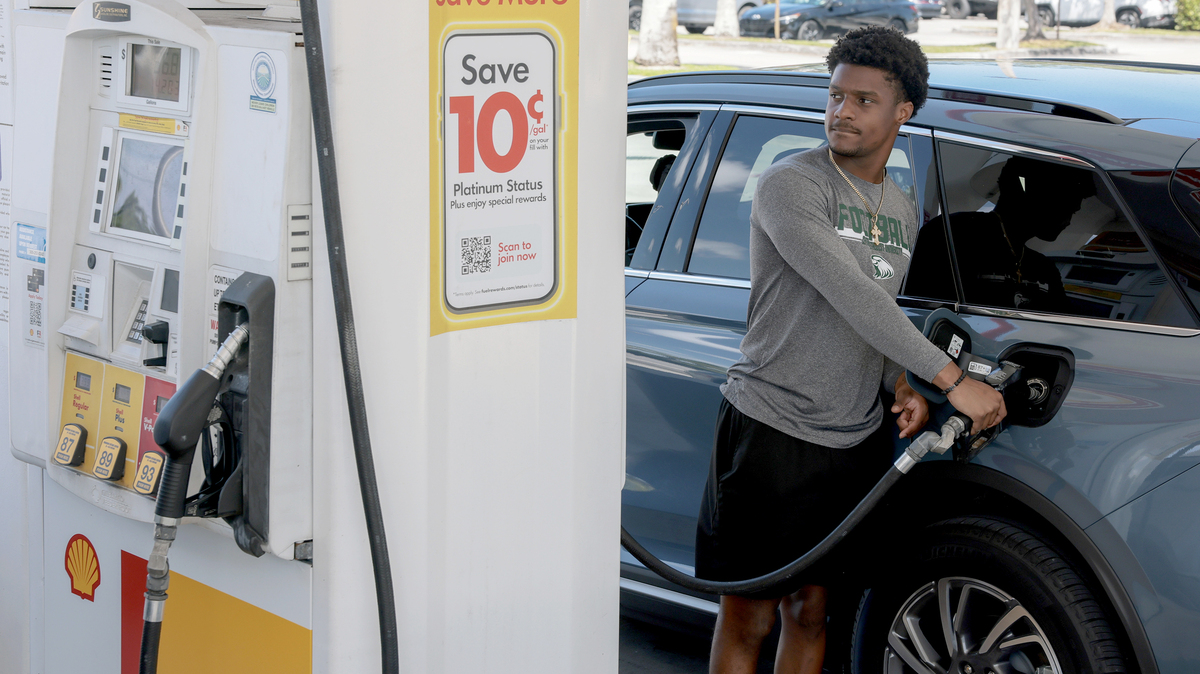 Kyndal Royal fills his vehicle with fuel at a gas station on April 13, 2026 in Miami, Florida. As the United States military blockades the Strait of Hormuz fuel prices rose above $100 dollars a barrel. (Joe Raedle/Getty Images/TNS)