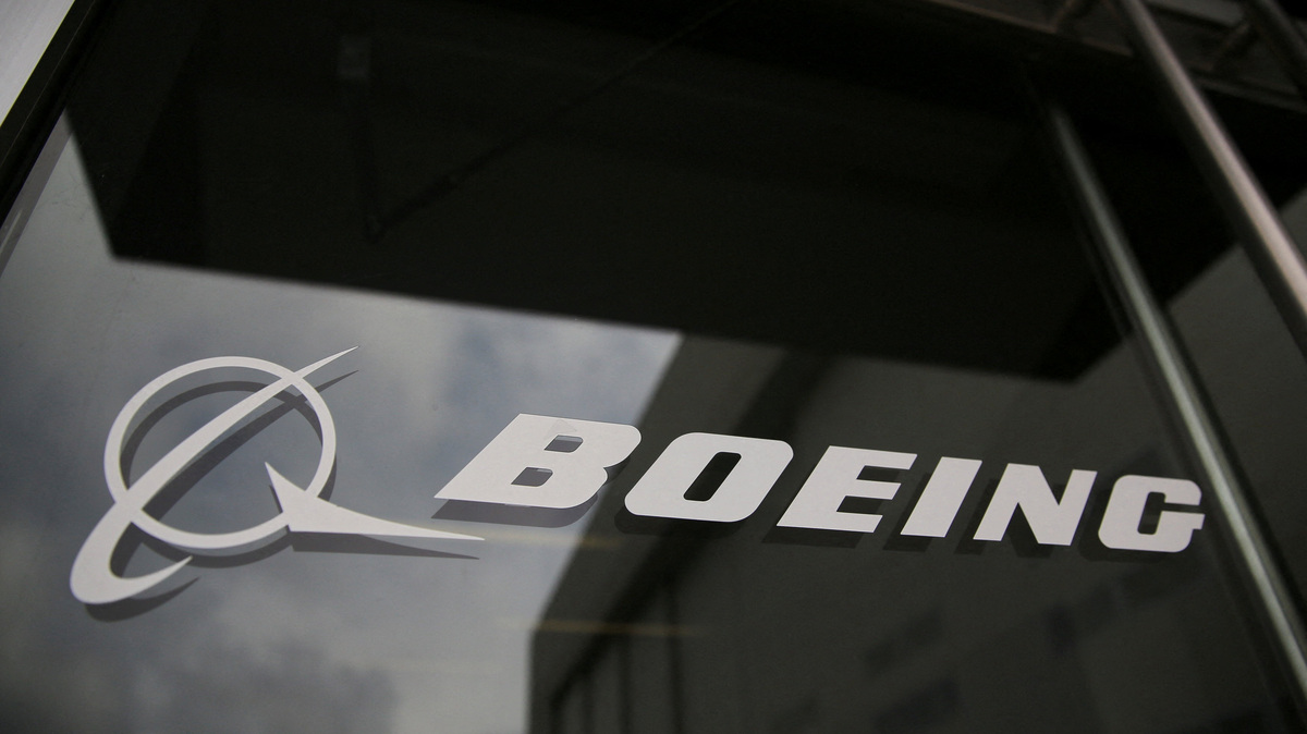 The Boeing logo on the doors to the Boeing factory in Renton, Washington, U.S., April 15, 2026.   REUTERS/Genna Martin