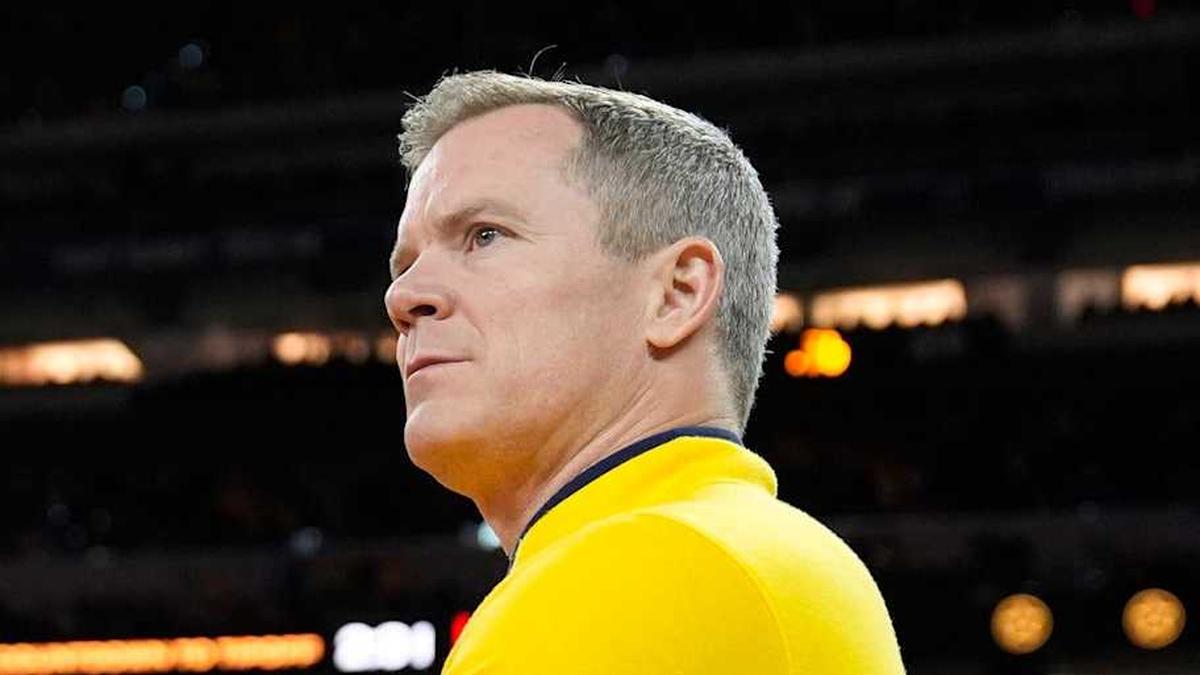  Michigan head coach Dusty May looks on from the court ahead of the NCAA national championship game against Connecticut at Lucas Oil Stadium in Indianapolis on Monday, April 6, 2026. | Junfu Han / USA TODAY NETWORK via Imagn Images 