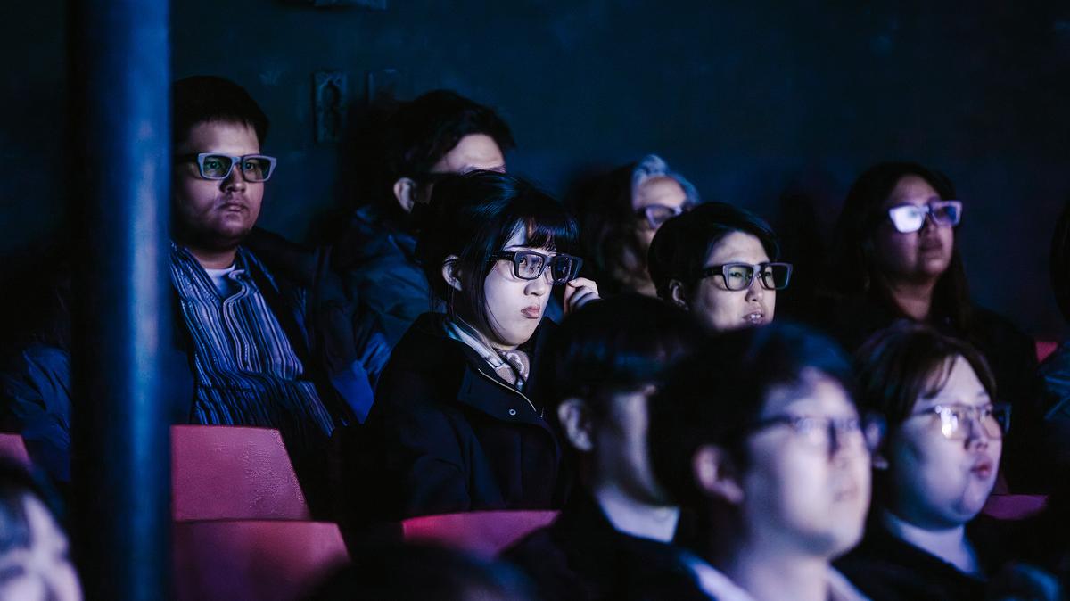 Some audience members wear smart glasses that project subtitles in Korean, English, Japanese or Chinese, at a production of "The Second Chance Convenience Store" at the Always Theater in Seoul, South Korea, March 19, 2026. Producers and cultural officials hope that artificial intelligence technology can overcome a language barrier and take South Korea's shows to the world.