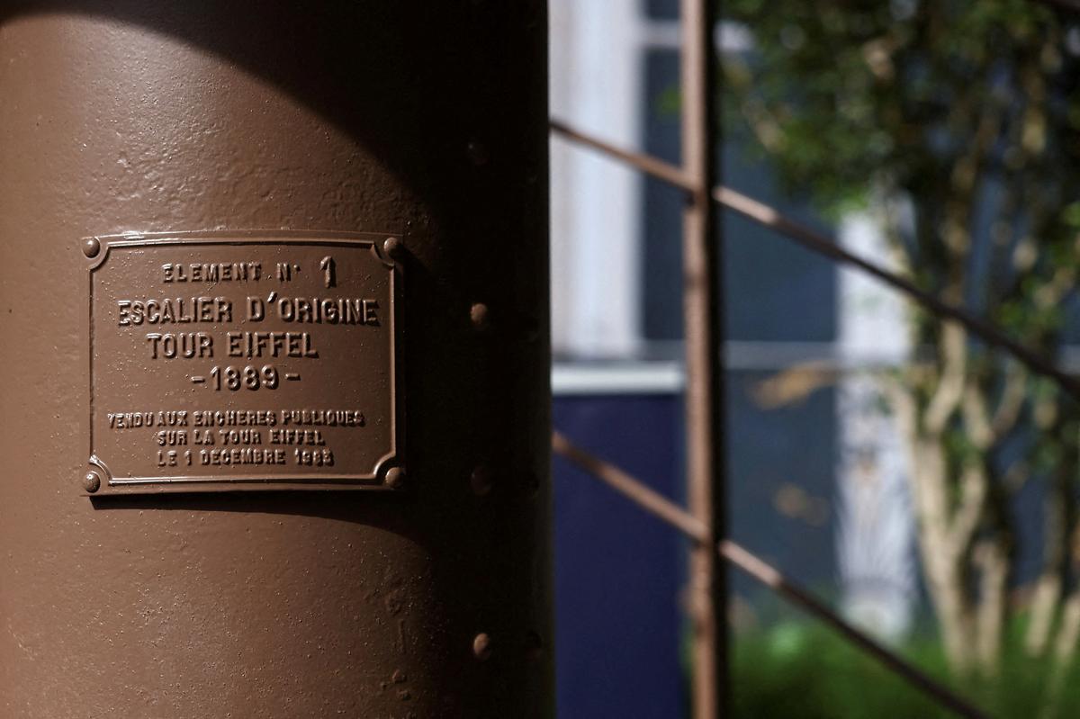 FILE PHOTO: A portion of the original staircase of the Eiffel Tower built by Gustave Eiffel in 1889 is displayed during a press preview ahead of its upcoming auction organized by Artcurial in Paris, France, May 13, 2026. REUTERS/Alice Sacco/File Photo