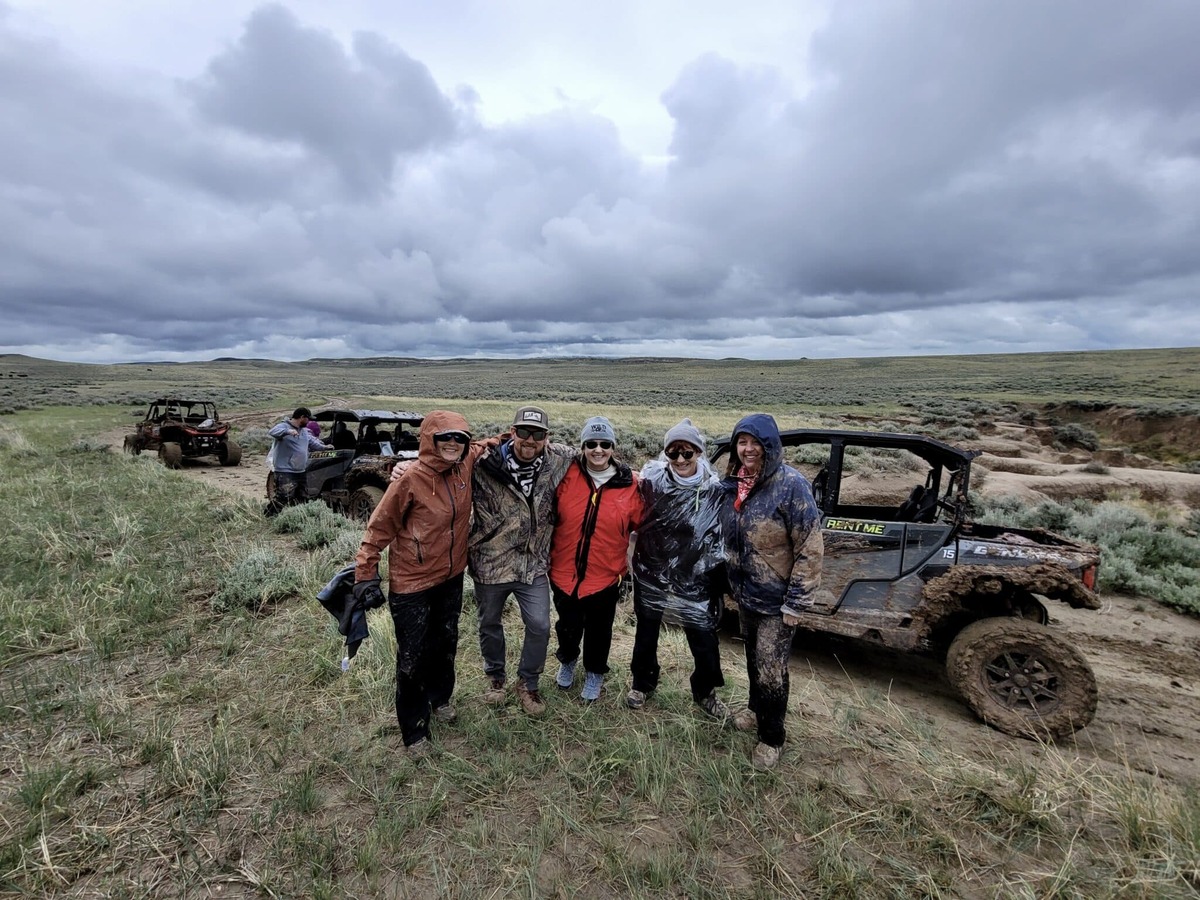  Muddy, but smiling. Our UTV ride was one of the most fun things I’ve done…ever. Photo credit: Cody Yellowstone 