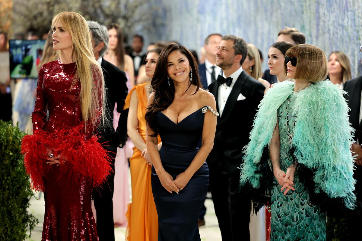 Nicole Kidman, Lauren Sanchez and Anna Wintour pose during the Met Gala, an annual fundraising gala held for the benefit of the Metropolitan Museum of Art's Costume Institute with this year's theme 'Costume Art' in New York City, New York, U.S., May 4, 2026. REUTERS/Daniel Cole