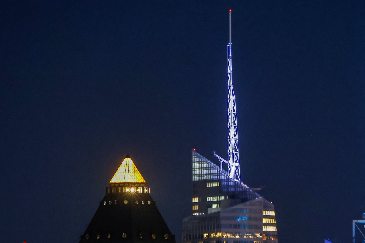 The Bank of America headquarters building in New York City is lit up for the SpaceX initial public offering as it is seen from West New York, New Jersey, U.S., June 4, 2026. REUTERS/Eduardo Munoz