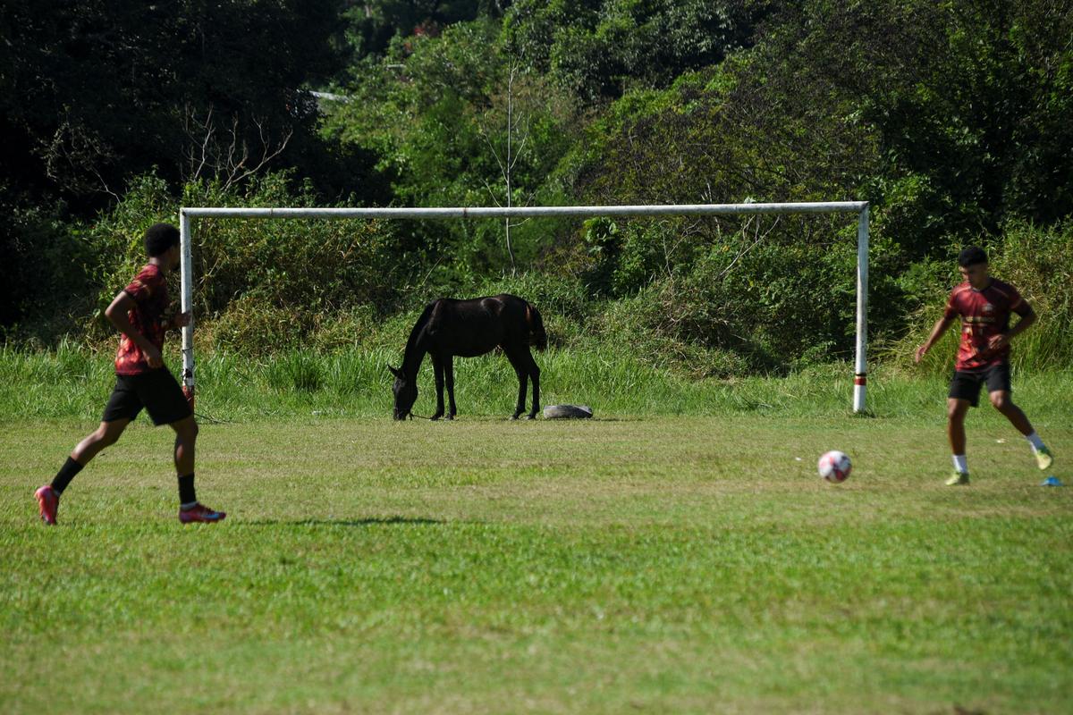 Players from Esporte Clube Originarios, a team composed entirely of Indigenous athletes, train ahead of a session in preparation for the Campeonato Carioca de Futebol - Serie C, in Marica, Rio de Janeiro, Brazil, April 30, 2026. REUTERS/Tita Barros
