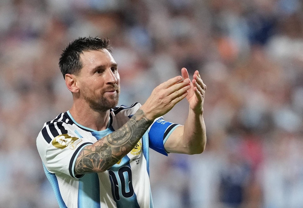  Argentina's Lionel Messi celebrates scoring their third goal to complete a hat-trick. IMAGN IMAGES via Reuters/Jay Biggerstaff