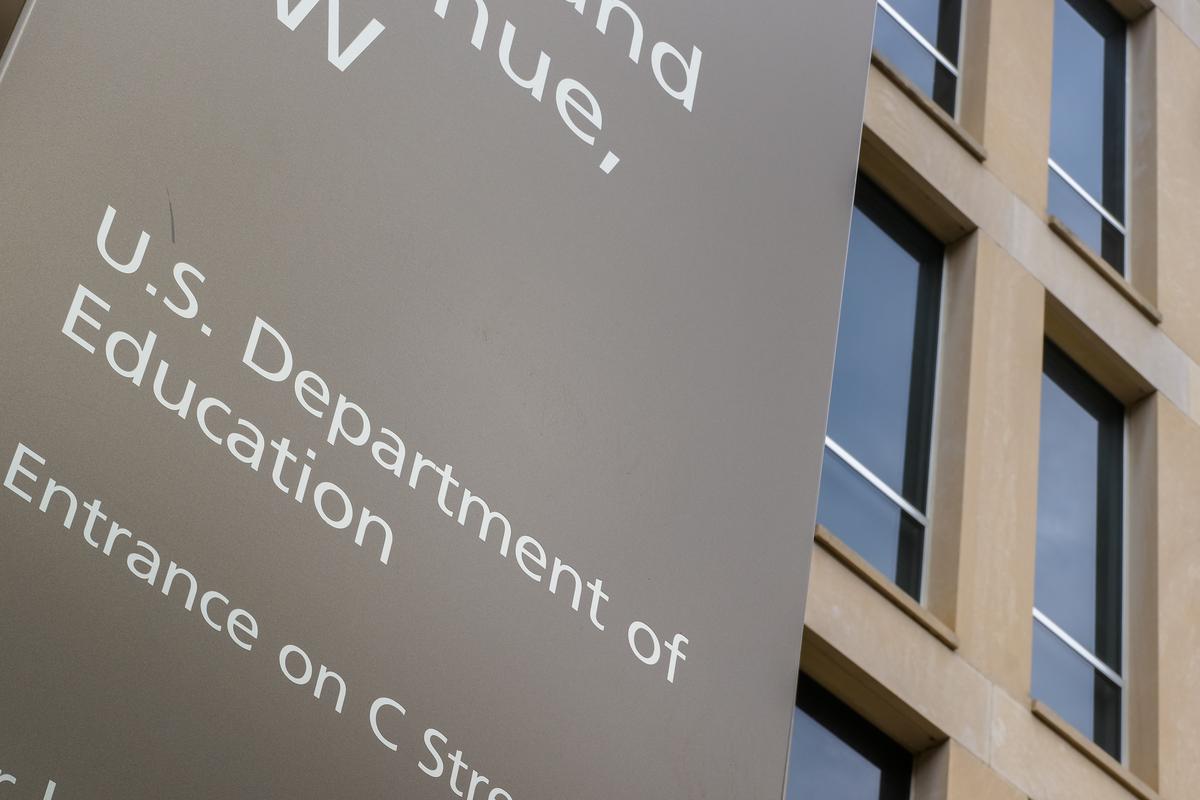  A sign marks the location of the U.S. Department of Education headquarters building on March 30 in Washington, DC. (Photo by J. David Ake/Getty Images) 