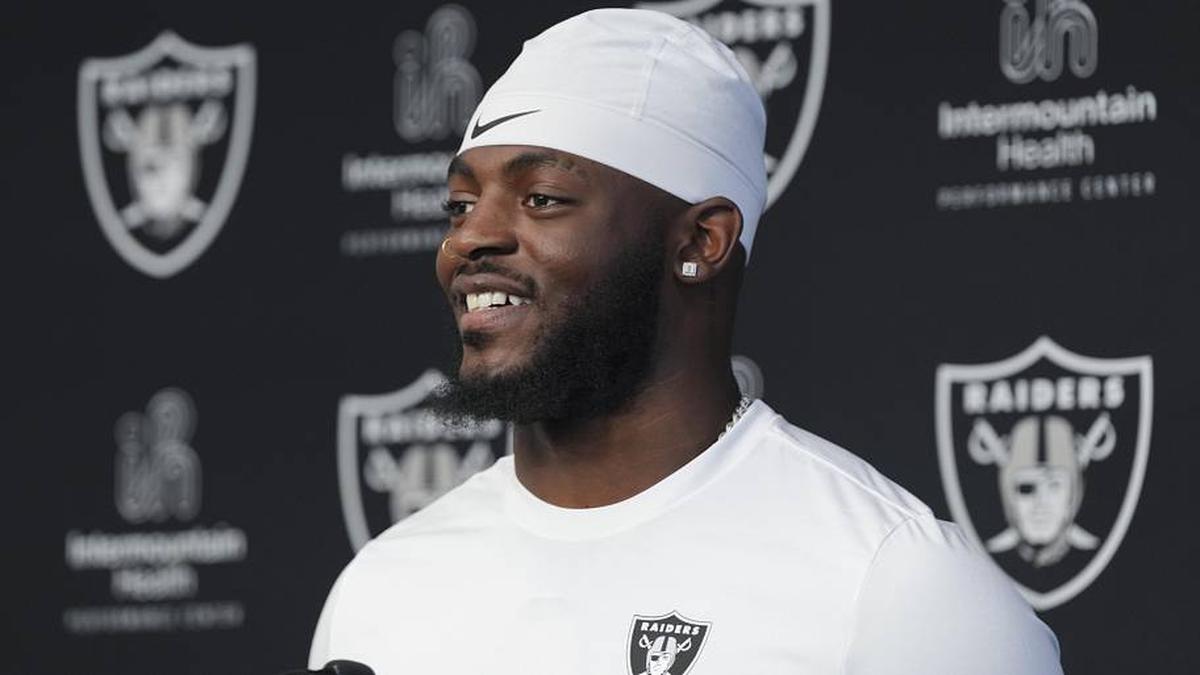  May 2, 2026; Henderson, NV, USA; Las Vegas Raiders defensive end Keyron Crawford (42) speaks during a news conference at the team's Rookie Minicamp at Intermountain Health Performance Center. Mandatory Credit: Candice Ward-Imagn Images | Candice Ward-Imagn Images 