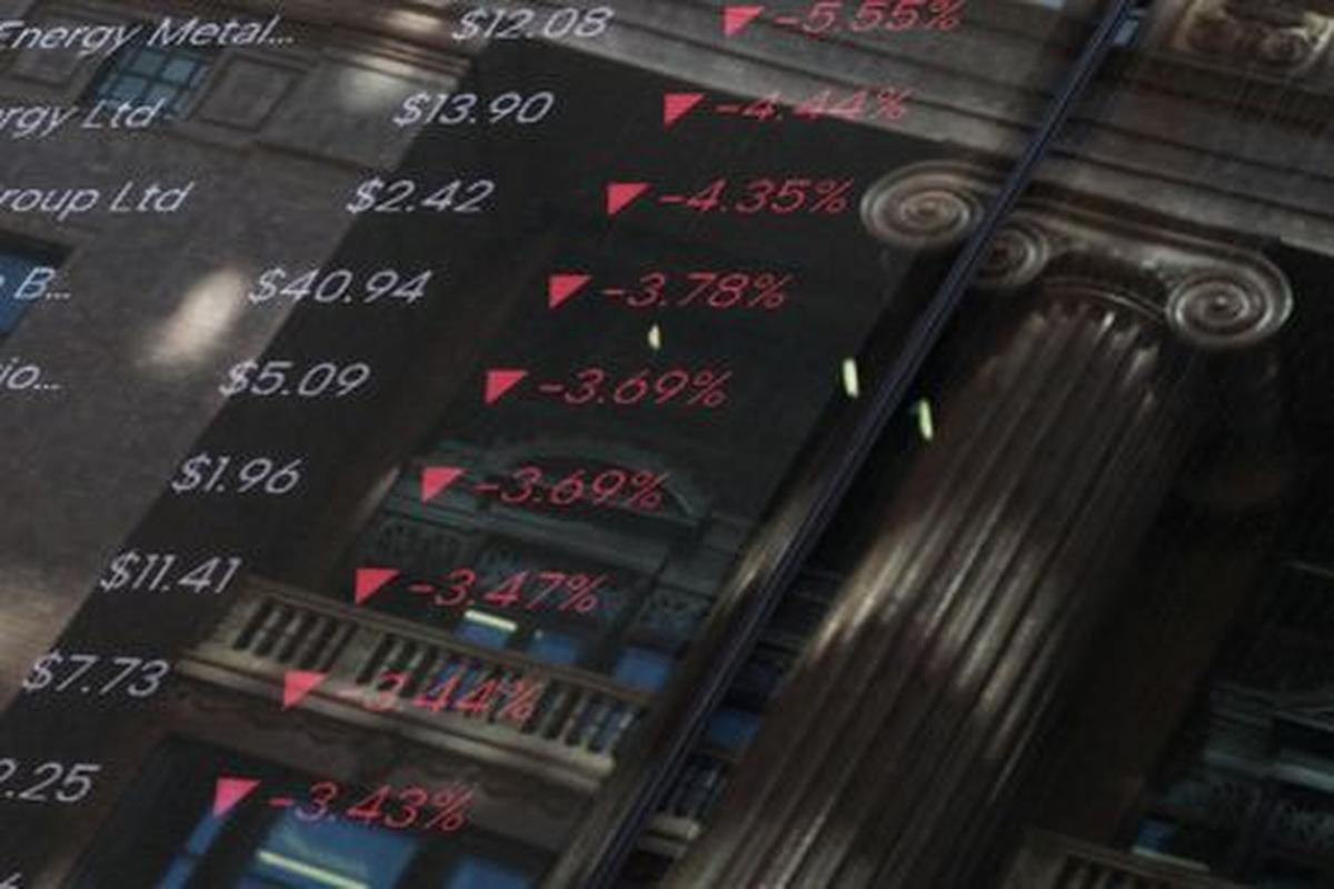Stock prices are displayed on a market board at the Australian Securities Exchange, in Sydney, Australia, April 20, 2026. REUTERS/Hollie Adams