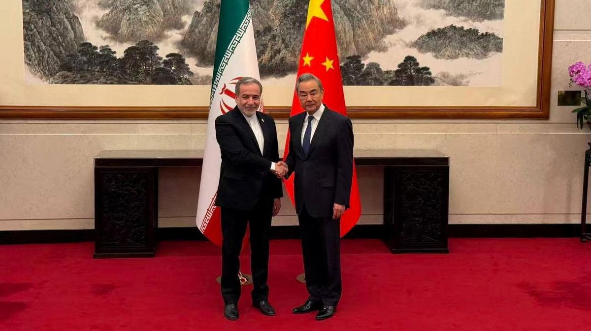 Iranian Foreign Minister Abbas Araqchi meets with Chinese Foreign Minister Wang Yi in a location given as Beijing, China, in this handout image released May 6, 2026. Seyed Abbas Araqchi via Telegram/Handout via REUTERS